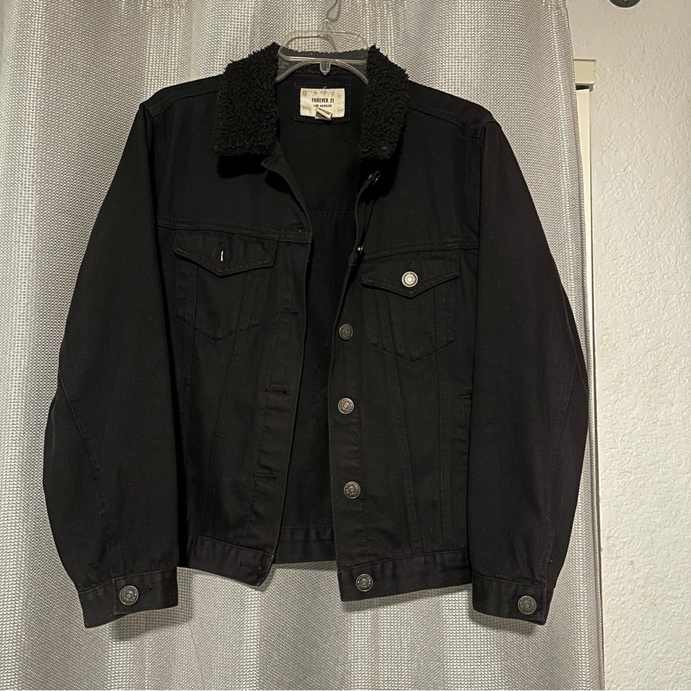 Black jean jacket with fur like collared